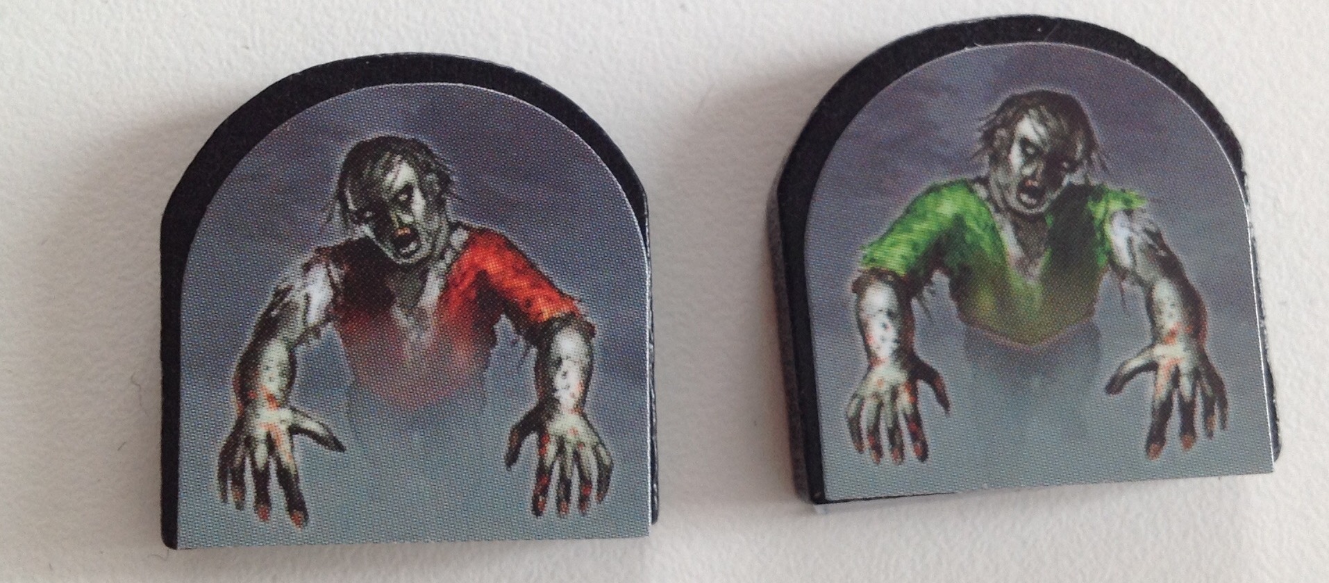 Farverne på zombiebrikkerne bruges til at holde styr på, hvilke zombier der har taget deres tur.